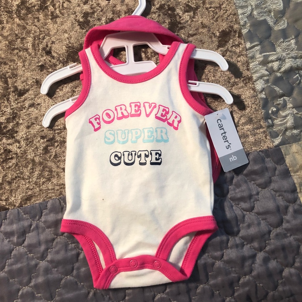 Two Newborn outfits